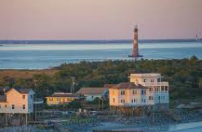 Morris Island Lighthouse at sunset near Folly Beach